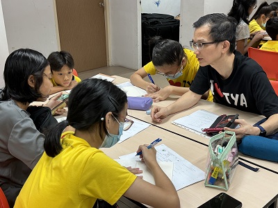 Boon Teck coaching students2_lowres Boon Teck coaching students2_lowres