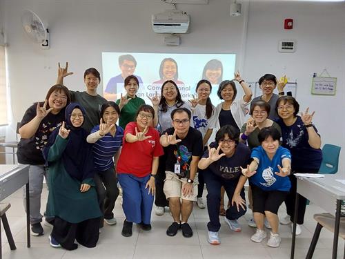 Darren See facilitating sign language workshops Darren See facilitating sign language workshops
