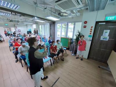 Mdm Chong sharing at centre Mdm Chong sharing at centre
