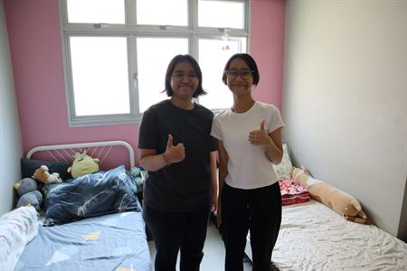 Mdm Rosilah's daughters in their new room Mdm Rosilah's daughters in their new room
