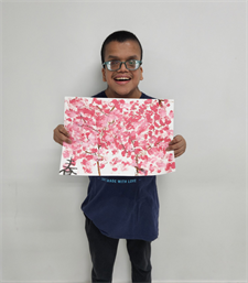 Nezan with his artwork Nezan with his artwork