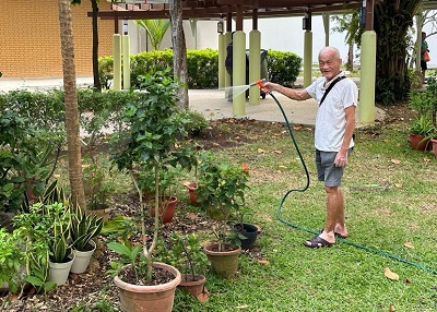 Senior Chew gardening